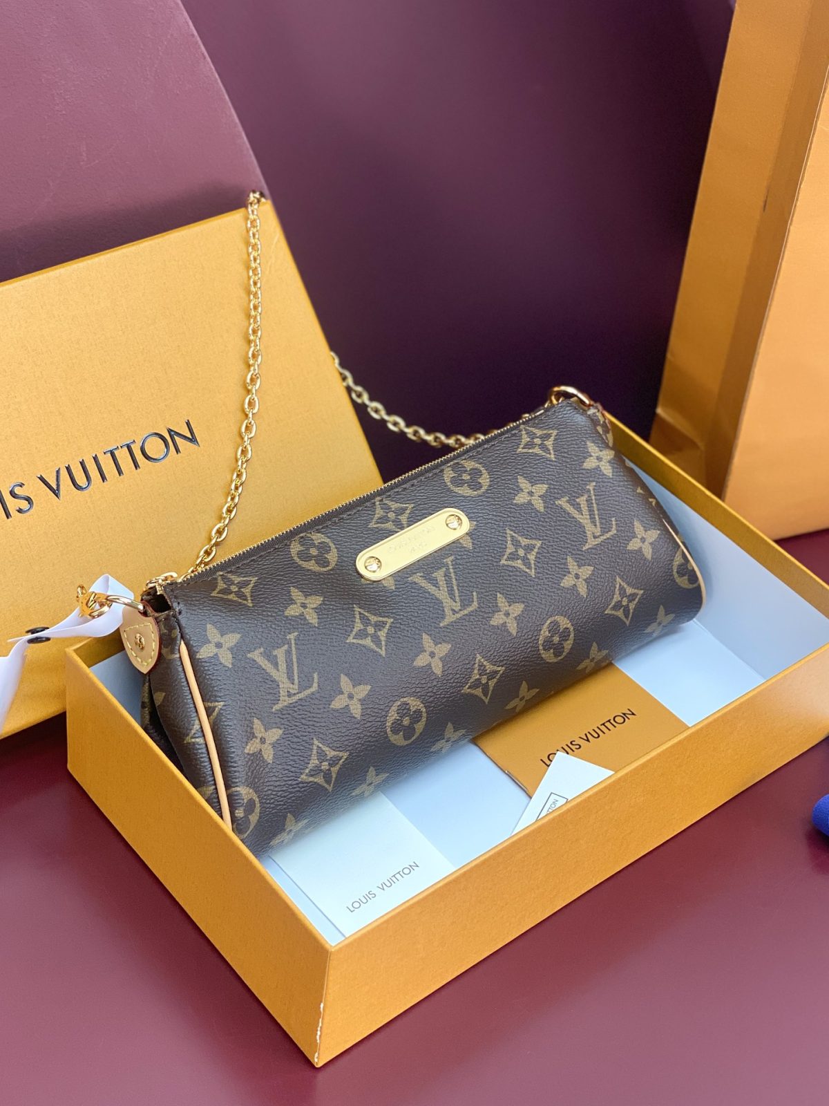 Louis Vuitton Pochette Eva Handbag | Classic Monogram Design - Image 1