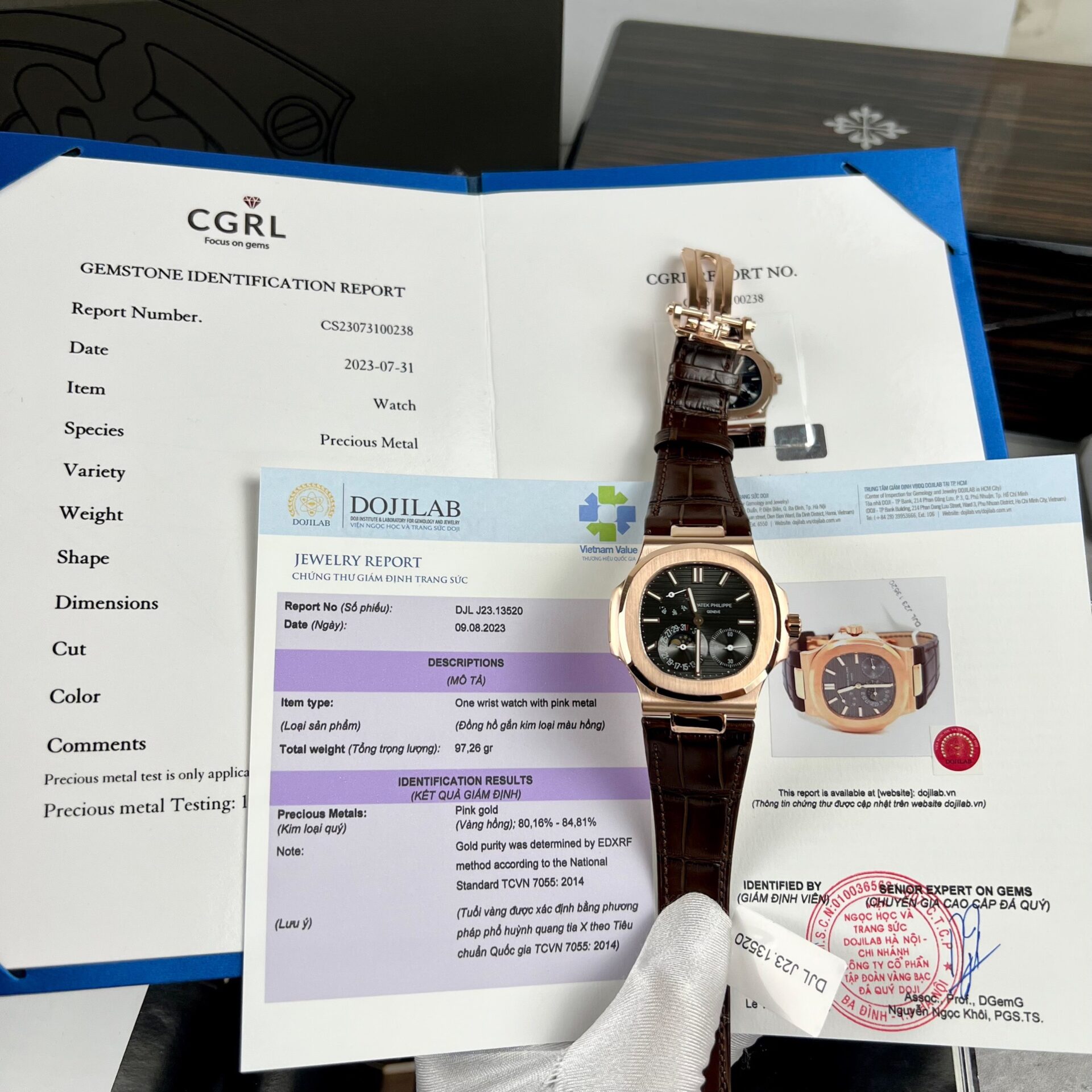 Dong-Ho-Patek-Philippe-Nautilus-5712R-Mat-Chocolate-Boc-Vang-Replica-11-40mm-2.jpg Patek Philippe Replica Watch Nautilus 5712R Chocolate Dial Gold Wrapped 40mm - Image 1