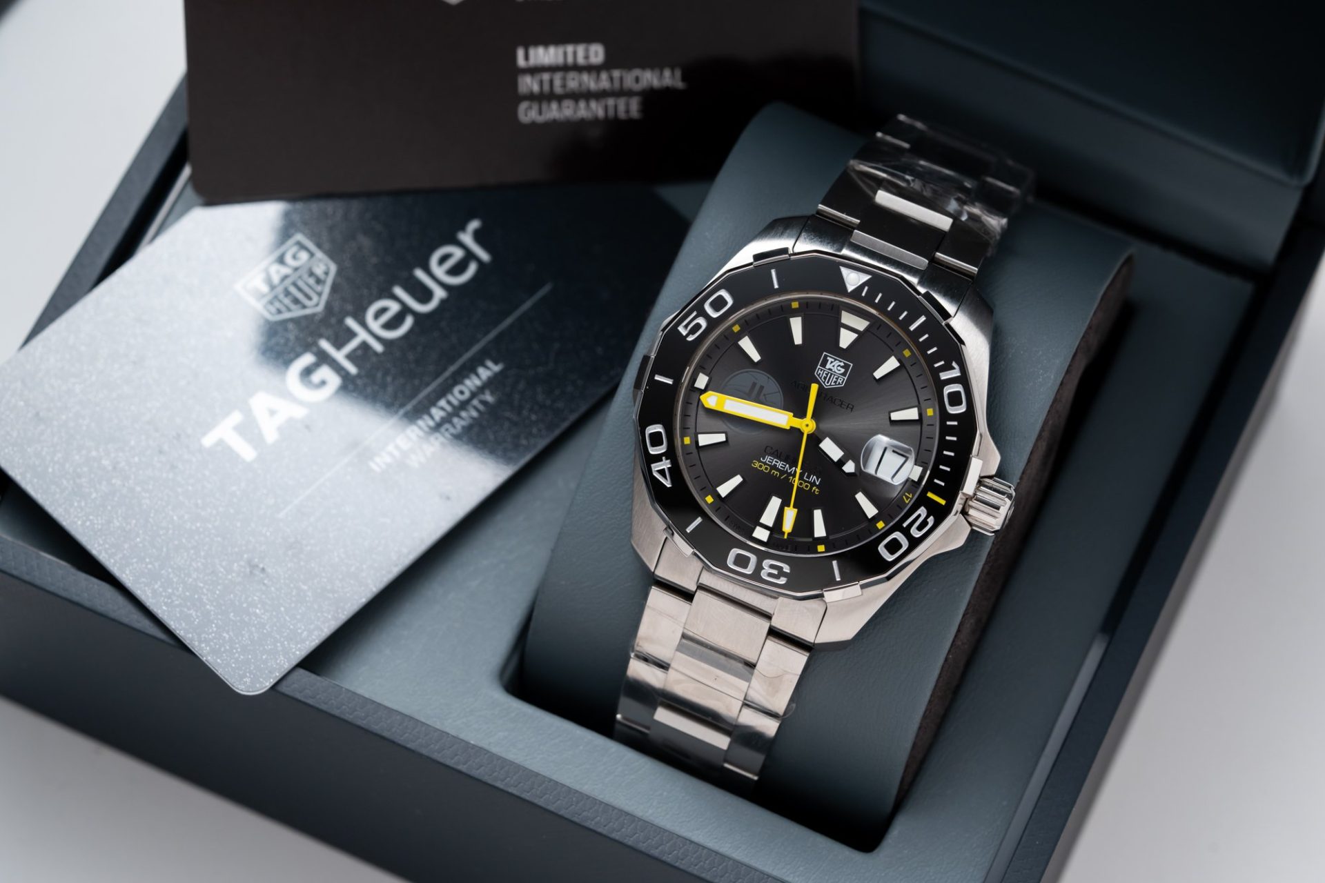 Dong-Ho-Tag-Heuer-Aquarace-Replica-Cao-Cap-Nhat-Nieng-Gom-43mm-9.jpg Tag Heuer Replica Watch Aquarace Ceramic Rim Metal Wire 43mm - Image 1